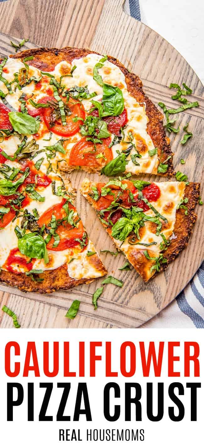 cauliflower pizza crust topped with margherita pizza toppings and cut into slices
