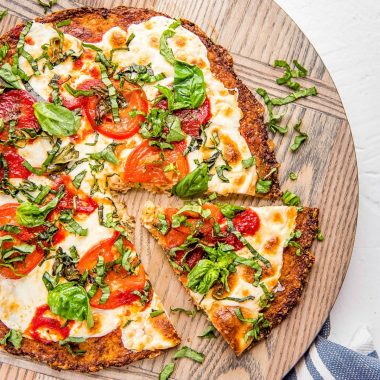 A healthier alternative to your pizza cravings - Cauliflower Pizza Crust is easy, flavor-packed, more filling, and can be frozen for later too!