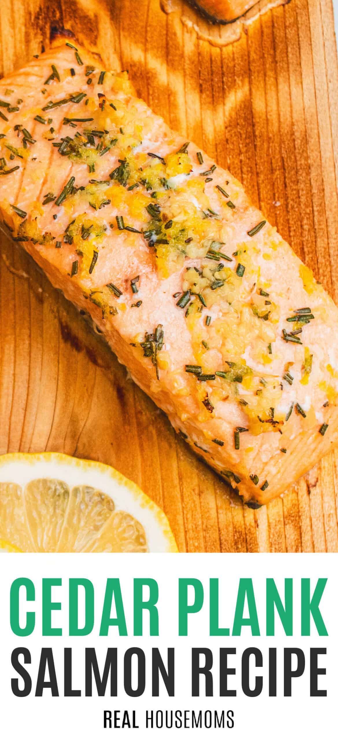 close up of cedar plank salmon on the wood with recipe name at the bottom