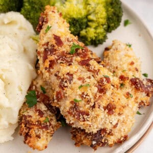 square image of cheddar bacon chicken tenders served with mashed potatoes and broccoli