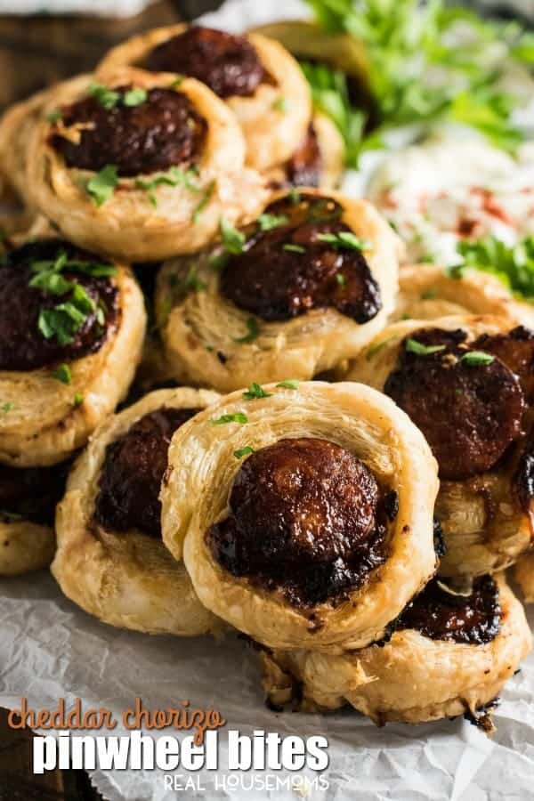 These delicious Chorizo Pinwheel Bites are stuffed with cheddar, drizzled with honey, and then baked until the pastry is puffed and golden. They can even be made a day ahead for a quick and easy appetizer!