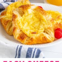 cheese danishes on a plate with raspberries with recipe name at the bottom