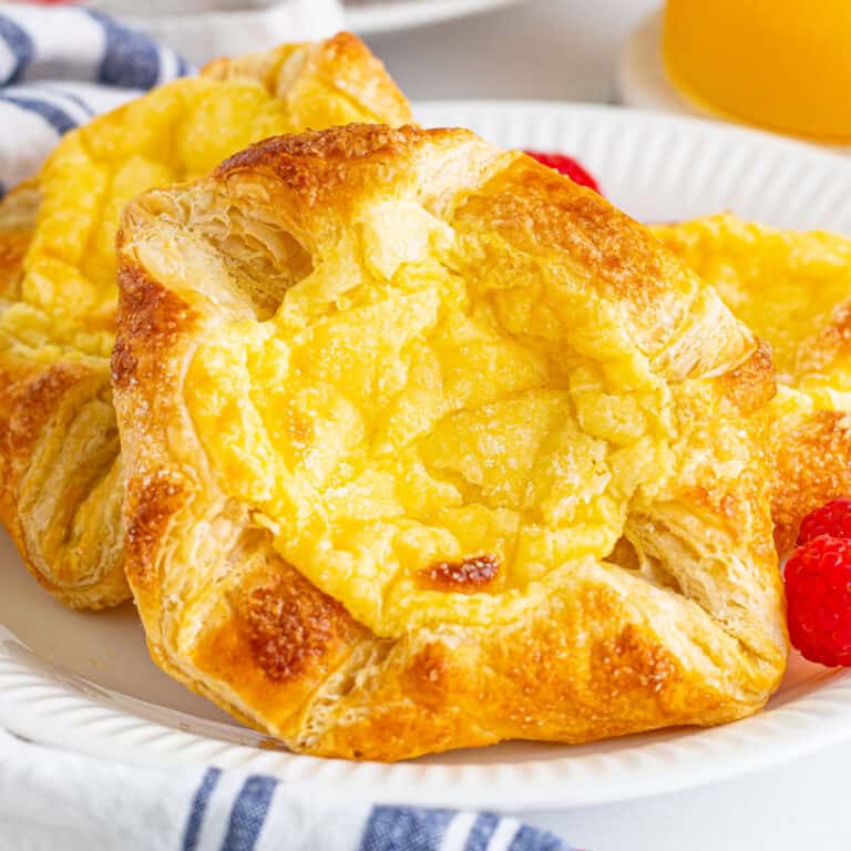 square image of cheese danishes on a palte