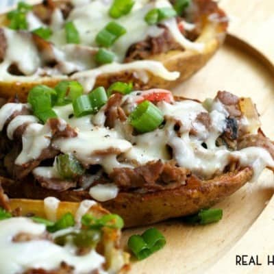 CHEESESTEAK POTATO SKINS are mash-up of classic potato skins and Philly Cheesesteak Sandwiches, making them the ultimate party appetizer!