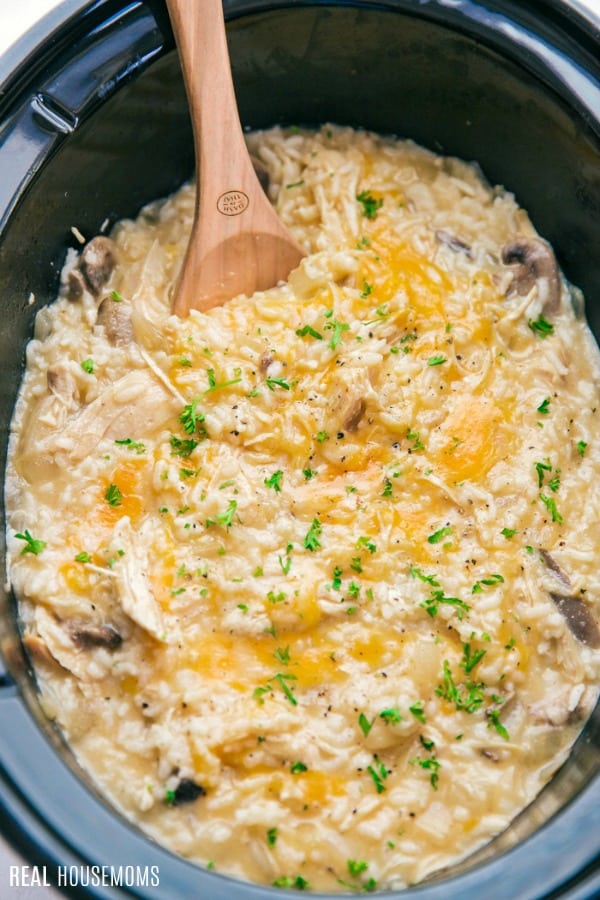 cheesy crock pot chicken and rice just after cooking in a crock pot