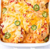 baking dish of cheesy salsa chicken after coking with recipe name at bottom