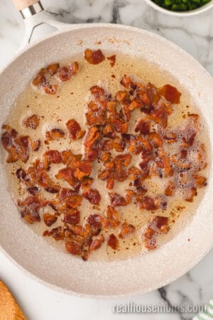 cooked dice bacon in a large skillet