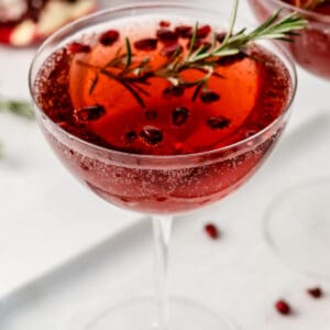 Cherry Pomegranate Champagne Cocktail