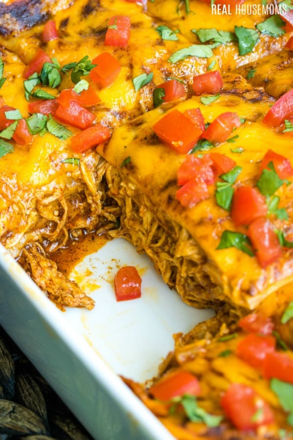 enchilada casserole with a slice taken out