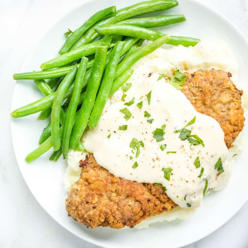 Chicken Fried Steak is classic comfort food of tender cube steak fried until golden and topped with creamy country gravy!