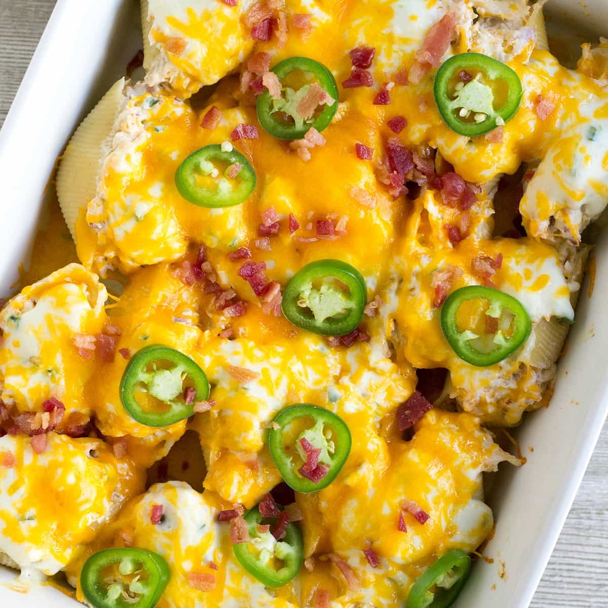 These Chicken Jalapeno Popper Stuffed Shells are a crave-able dinner perfect for busy weeknights!