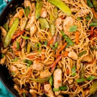 square image of chicken lo mein in a skillet