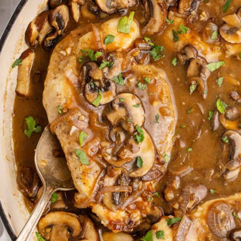 square image of chicken marsala in a skillet