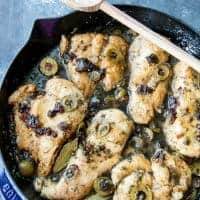 Deliciously flavorful Chicken Mirabella is sweet and savory, with prunes, capers, and green olives, it is one of the best things I have ever eaten. Seriously, a total favorite, and super easy to make too!