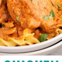 chicken paprikash over egg noodles in a bowl with recipe name at the bottom