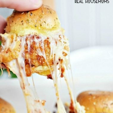 These Chicken Parmesan Sliders are an easy recipe made with fried chicken tenders, tomato sauce, and lots of cheese!