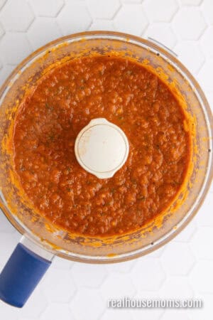 chicken tinga marinade in a food processor bowl after being pureed