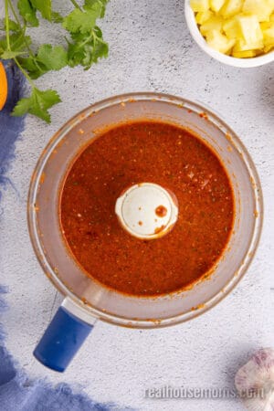 al pastor marinade in a food processor bowl