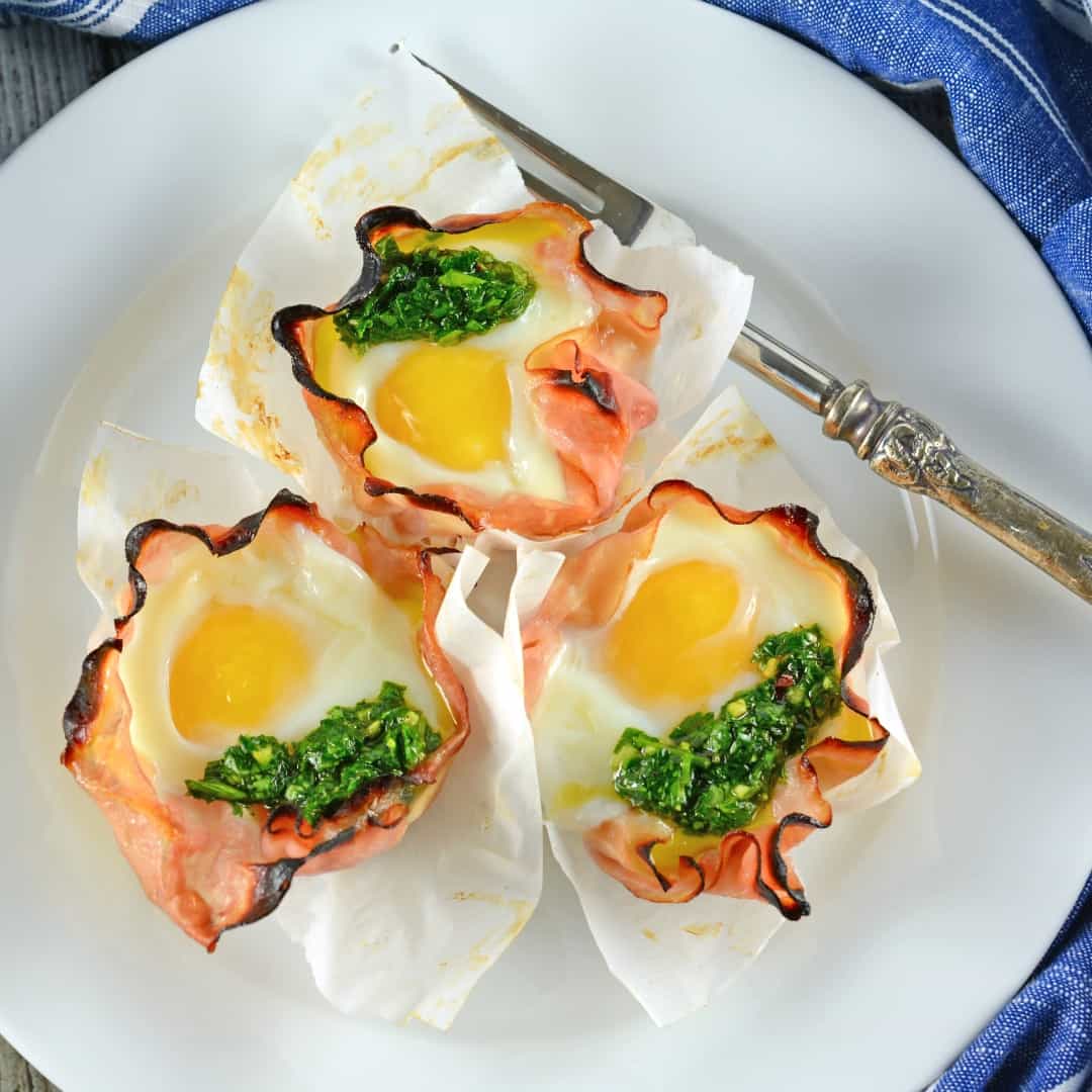 Chimichurri Egg Cups are an easy breakfast recipe perfect for feeding a crowd. They can also be frozen for breakfast on the go!