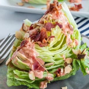 Chipotle Tomato Wedge Salad recipe is a perfect salad with a kick. Crunchy lettuce, hearty toppings & spicy homemade dressing will be your new food craving!