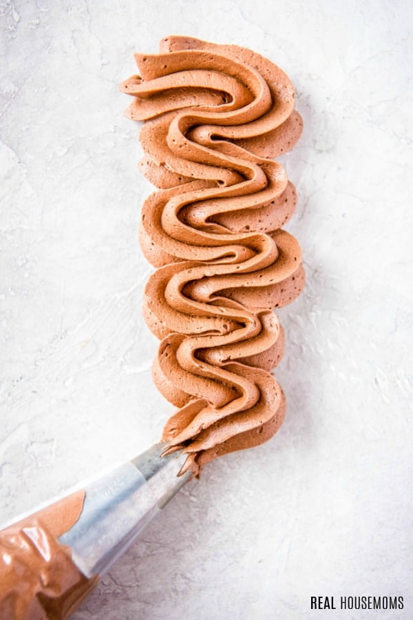 chocolate buttercream frosting swirl from a piping bag