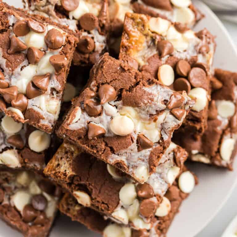 square image of chocolate cake mix bars arrange on a plate