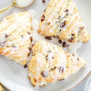 These are the perfect Chocolate Chip Scones! Tender, buttery, studded with chocolate chips and flavored with vanilla for a coffeehouse dream!