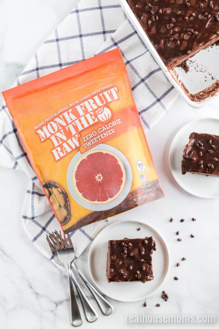 slices of chocoalte icebox cake on plates with a bag of monk fruit in the raw
