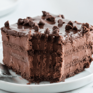 Easy chocolate icebox cake made with chocolate mousse, chocolate graham crackers, and chocolate ganache, is going to be your new favorite summer treat!