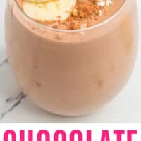 chocolate peanut butter banana smoothie in a glass with banana slices, oats and cocoa powder for garnish with recipe name at the bottom