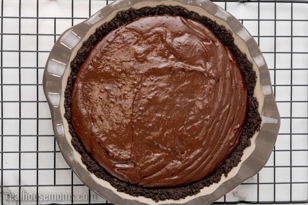 chocolate pudding in an oreo pie crust in a pie plate
