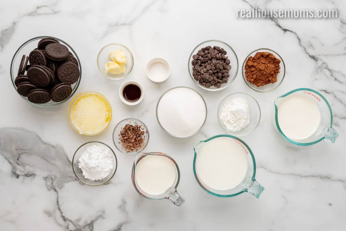 ingredients to make chocolate pudding pie in bowls on a counter