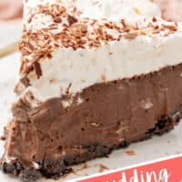 close up image of a slice of chilled chocolate pudding pie on a small white plate with the title of the post at the bottom