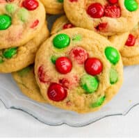 plate of christmas M&M cookies with recipe name at the bottom