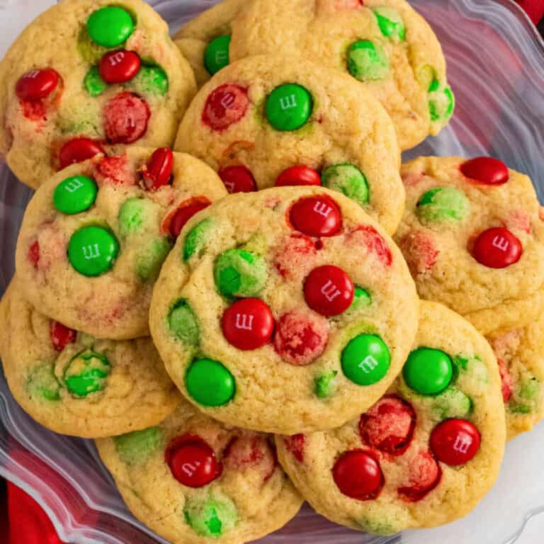 square image looking down at a plate full of christmas M&M cookies