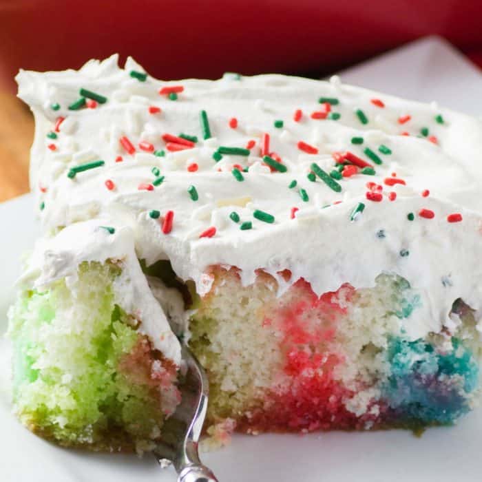 Christmas Rainbow Poke Cake ⋆ Real Housemoms