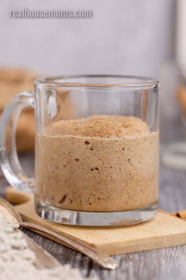 cinnamon roll mug cake in a mug after being cooked