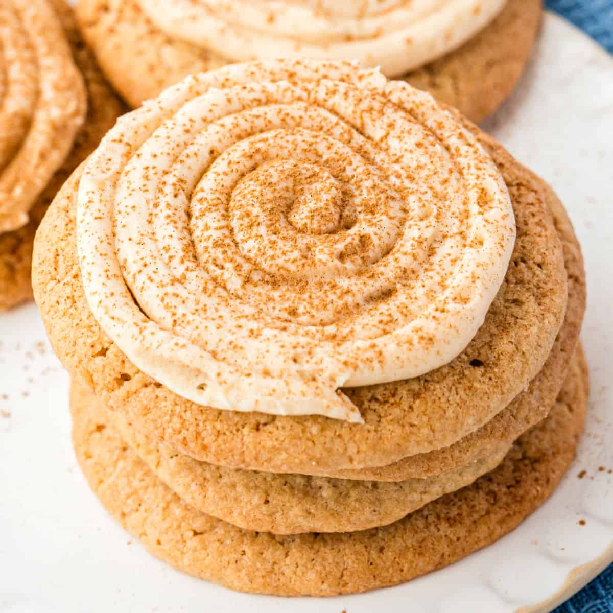 square image of a stack of cinnamon roll sugar cookies