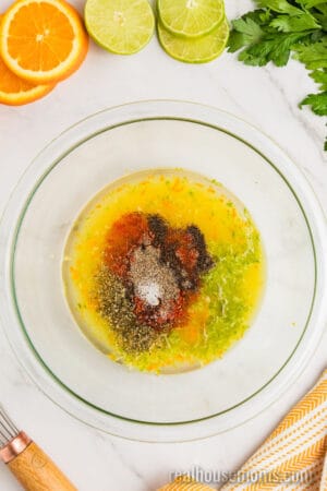 citrus chicken marinade ingredients in a glass mixing bowl