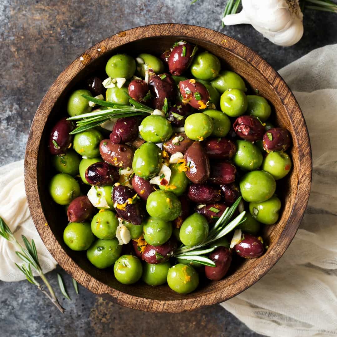 Are you an olive fan? I love the briny saltiness they have! One of my new favorite appetizers is this Citrus Herb Marinated Olives recipe. It’s super easy to make, and is sure to please a crowd!
