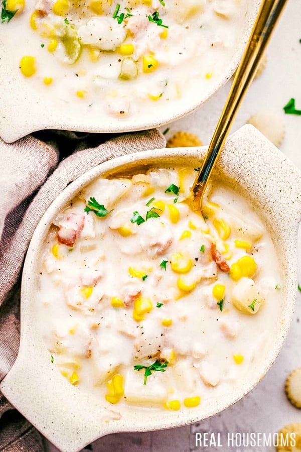 bowl of clam chowder with a spoon