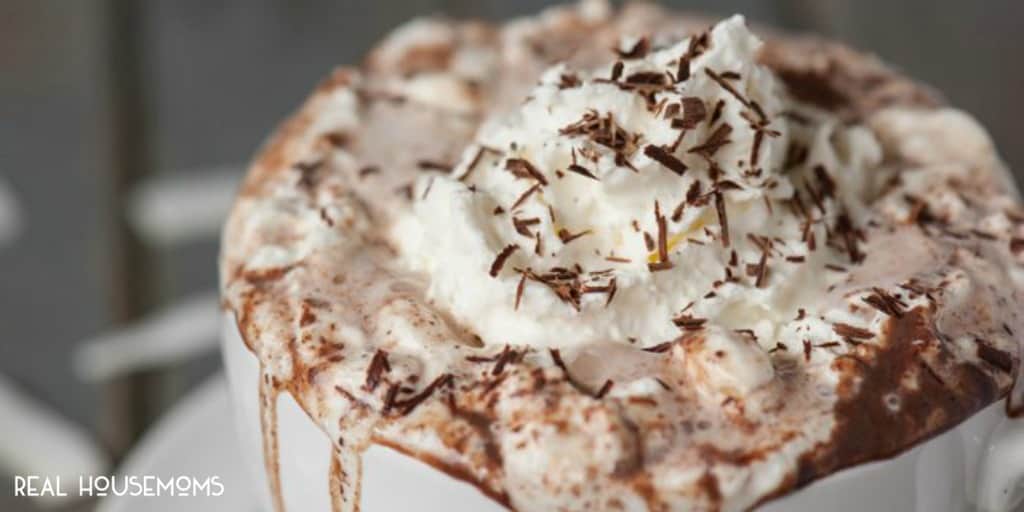Rich and decadent Coconut Rum Hot Cocoa made from milk, half and half, chocolate, and coconut rum will warm your belly and put a smile on your face!