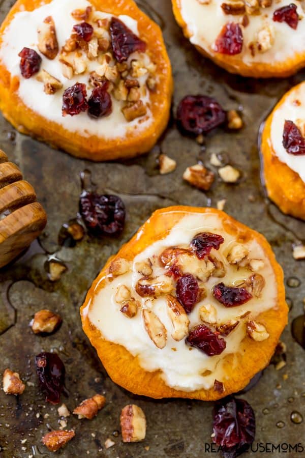 Delight your holiday guests with Sweet Potato Rounds with Goat Cheese! They're loaded with fall flavors for the perfect party bite!