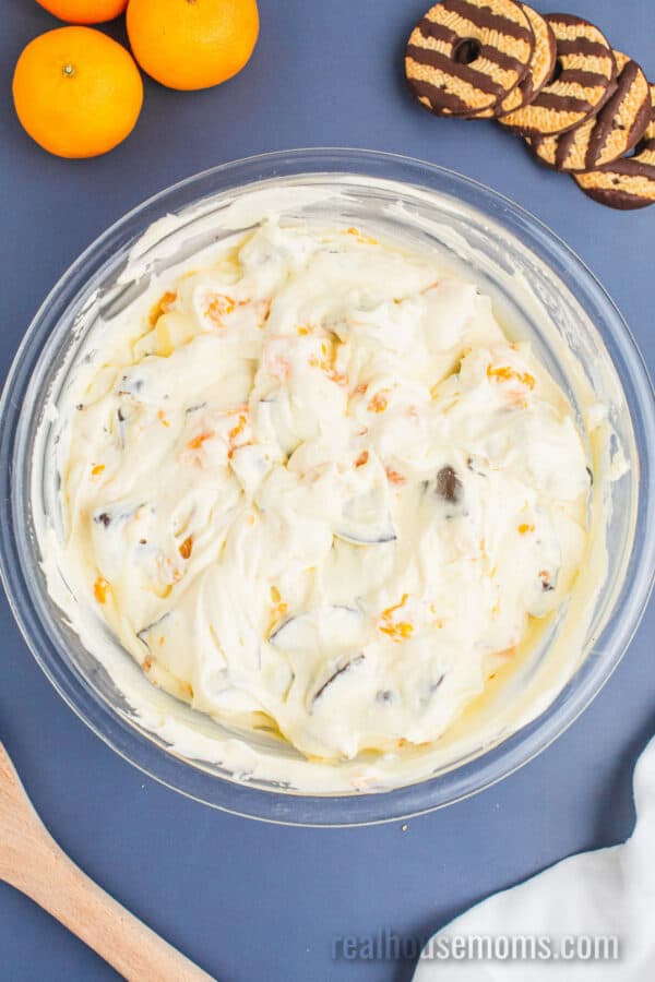 cookie salad in a mixing bowl after being stirred toegether
