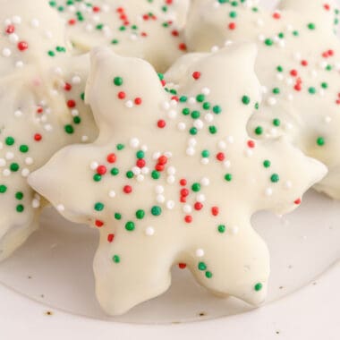 square image of christmas cookies & cream marshmallow treats on a plate