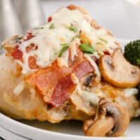 square image of alice springs chicken on a plate with broccoli