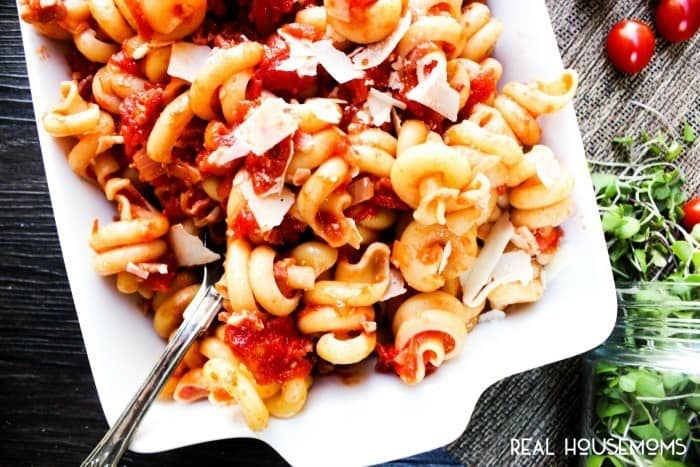 COPYCAT CARRABBA'S CAVATAPPI AMATRICIANA is easy, delicious and ready in 30 minutes! Made with a zesty tomato sauce and paired with cavatappi noodles, this pasta is a dish the entire family will love!