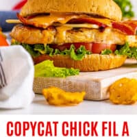 copycat chick fil a grilled chicken club next to a chick fil a cup with recipe name at the bottom