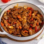 square image of a skillet of copycat panda express beijing beef