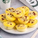 square image of copycat starbucks bacon & gruyere egg bites piled on a plate